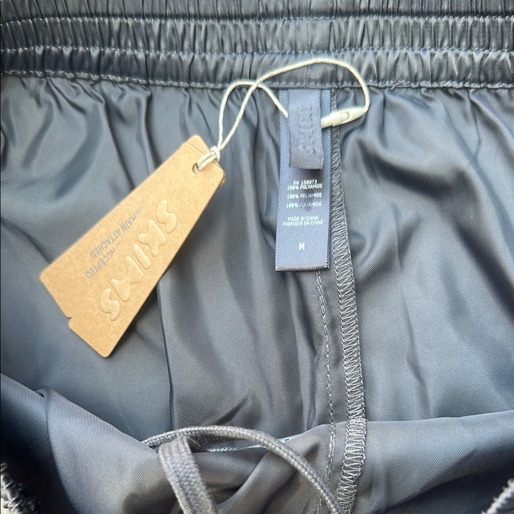 SKIMS Women's Athletic Shorts in Gunmetal NWT - Picture 2 of 3